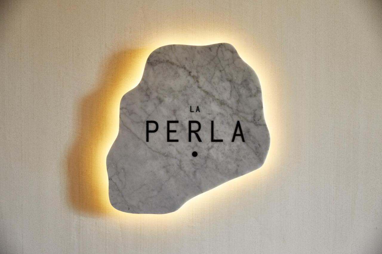 The Plaza Hotel Pioneer Park El Paso Exteriör bild La Perla logo